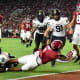 Alabama Crimson Tide running back Jahmyr Gibbs (1) stretches across the goal line for a touchdown against Vanderbilt Commodores linebacker Ethan Barr (32) at Bryant-Denny Stadium.